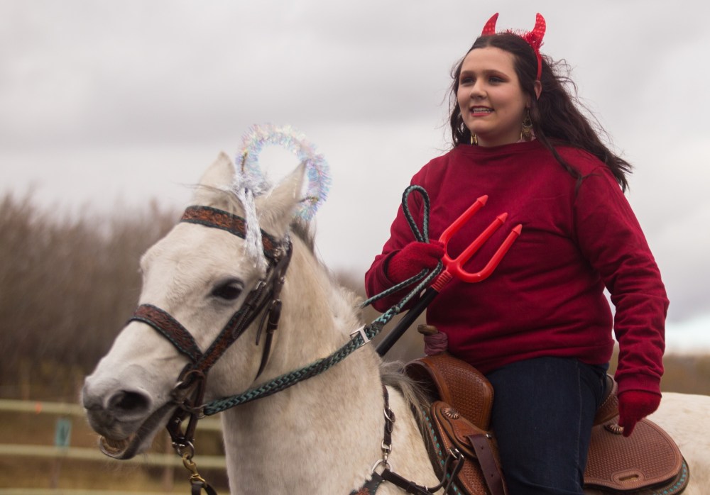 Natalie Elias, 14, and her horse Silver participate in the costume contest at the Lucky Break Ranch Halloween Jackpot Race Sunday. (Chelsea Kemp/The Brandon Sun)