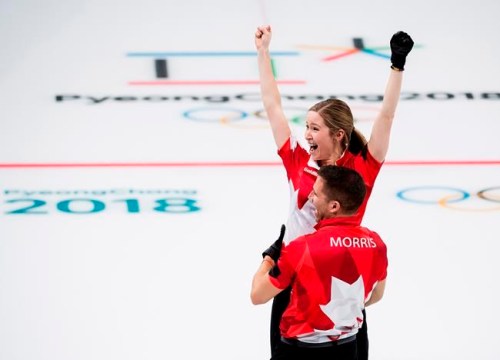 Canadians Kaitlyn Lawes and John Morris react after defeating Switzerland to win gold during mixed doubles curling action at the 2018 Olympic Winter Games in Gangneung, South Korea on Tuesday, February 13, 2018. THE CANADIAN PRESS/Nathan Denette