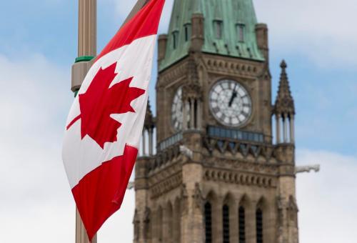 Adrian Wyld - THE CANADIAN PRESS
A Canadian flag along the road in front of the Parliament buildings ahead of Canada Day in Ottawa.