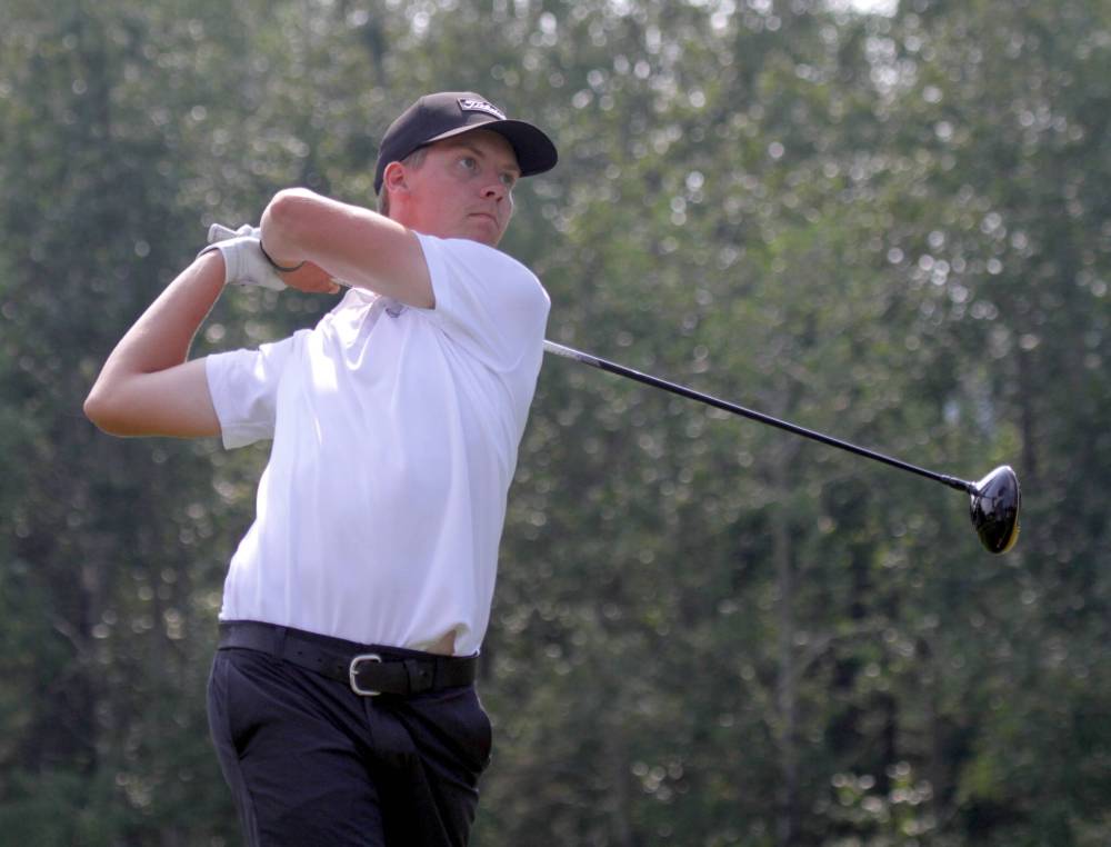 Evan Nachtigall hits a tee shot during the Tamarack men's quarterfinals at Clear Lake Golf Course on Thursday. (Thomas Friesen/The Brandon Sun)