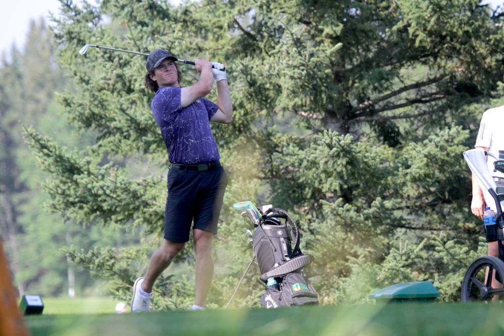 Nolan Ritchie hits a tee shot during the Tamarack men's quarterfinals at Clear Lake Golf Course on Thursday. (Thomas Friesen/The Brandon Sun)
