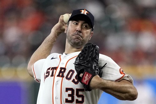 FILE - Houston Astros starting pitcher Justin Verlander throws to a Minnesota Twins batter during the first inning of a baseball game Aug. 23, 2022, in Houston. Verlander won the American League Cy Young Award on Wednesday night, Nov. 16. (AP Photo/David J. Phillip, File)