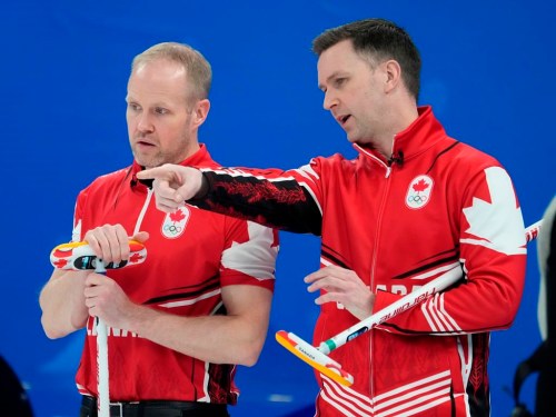 Canada skip Brad Gushue, right, discusses a shot with third Mark Nichols during their bronze medal curling match against the United States Friday, February 18, 2022 at the 2022 Winter Olympics in Beijing. Curling Canada is hoping an ongoing high-performance review will help put the federation on track for success after a disappointing showing on the international stage last season.THE CANADIAN PRESS/Ryan Remiorz