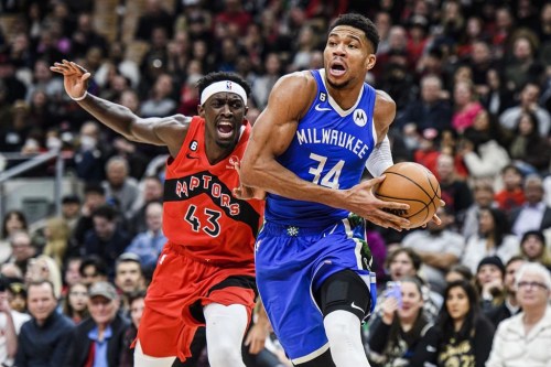 Milwaukee Bucks forward Giannis Antetokounmpo (34) drives towards the net as Toronto Raptors forward Pascal Siakam (43) defends during first half NBA basketball action in Toronto on Wednesday, January 4, 2023. THE CANADIAN PRESS/Christopher Katsarov