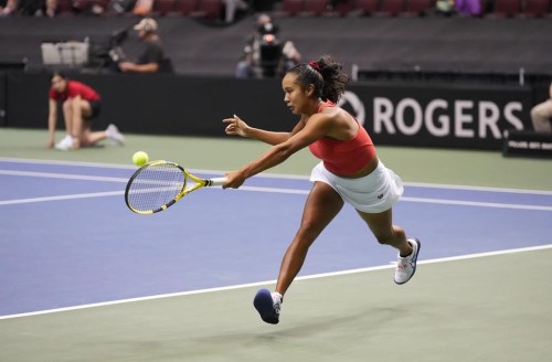 Canada's Leylah Annie Fernandez returns to Latvia's Daniela Vismane during a Billie Jean King Cup qualifier singles tennis match, in Vancouver, on Saturday, April 16, 2022. THE CANADIAN PRESS/Darryl Dyck