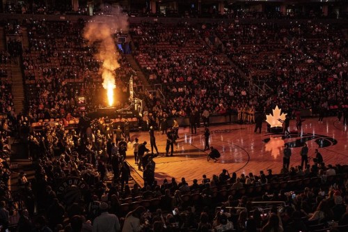 A pyrotechnics display illuminates the Scotiabank Arena before the Toronto Raptors take on the Dallas Mavericks in NBA basketball action in Toronto on November 26, 2022. THE CANADIAN PRESS/Chris Young