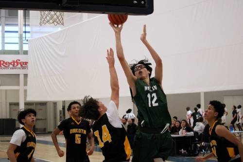 Max Winters of the Neelin Spartans leaps up to make a shot during his team's Brandon Sun Spartans Invititational Tier 1 semifinal game with the Dakota Lancers on Saturday afternoon at the Healthy Living Centre. (Lucas Punkari/The Brandon Sun)