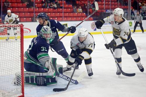 Zakhar Polshakov (71) and Brett Hyland (74) of the Brandon Wheat Kings chase the puck into Seattle goaltender Scott Ratzlaff’s crease during WHL action at Westoba Place on Tuesday evening. (Photos by Tim Smith/The Brandon Sun)