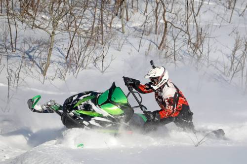 Luke McNabb finds some deep snow on his snowmobile outside Minnedosa. (File)