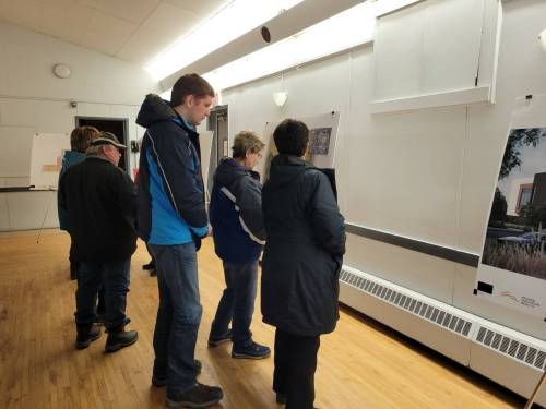 Local residents take a look at architectural plans for Neepawa's new hospital, which will be complete in 2025. (Miranda Leybourne/The Brandon Sun)