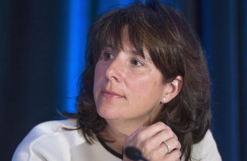 Sophie Brochu, listens to proceedings at an annual meeting in Montreal, Tuesday, March 22, 2016. Brochu, the president and CEO of Quebec's electric utility, announced she will step down from her post on April 11.THE CANADIAN PRESS/Paul Chiasson