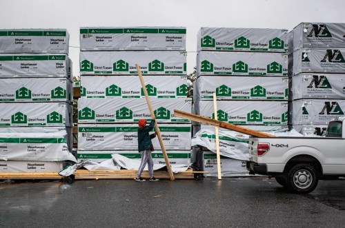 A customer loads lumber into the back of a pickup truck in Maple Ridge, B.C., on Friday, June 12, 2020. Canadians are now eligible for a tax credit that will help pay for renovations to build a secondary suite for family member who is a senior or an adult with a disability.THE CANADIAN PRESS/Darryl Dyck