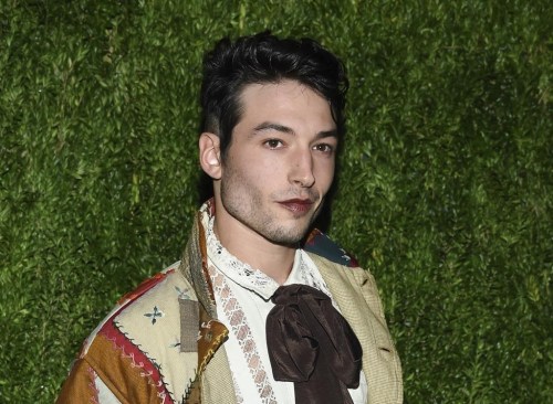 FILE - Ezra Miller attends the 15th annual CFDA/Vogue Fashion Fund event at the Brooklyn Navy Yard in New York on Nov. 5, 2018. Miller, known for playing 