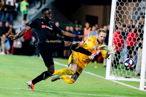 Seattle Sounders goalkeeper Stefan Frei, right, makes a save against Los Angeles FC forward Adama Diomande during the second half of the MLS soccer Western Conference final Tuesday, Oct. 29, 2019, in Los Angeles. Toronto FC has signed Norwegian forward Diomande through 2024 with an option for 2025. THE CANADIAN PRESS/AP/Ringo H.W. Chiu